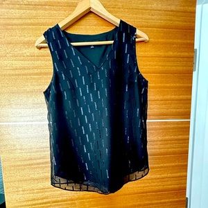 Elegant, sparkly timeless top for a night out.